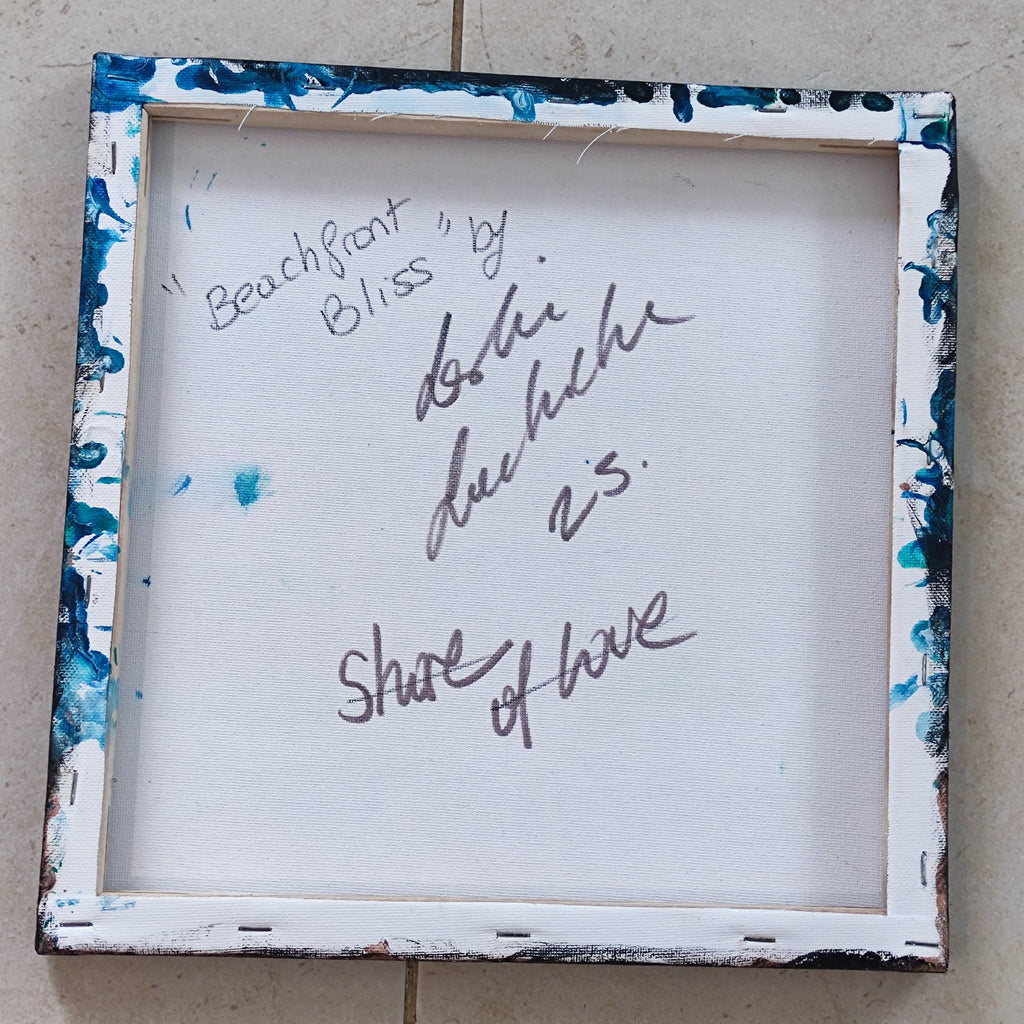Framed artwork with text on a tiled floor