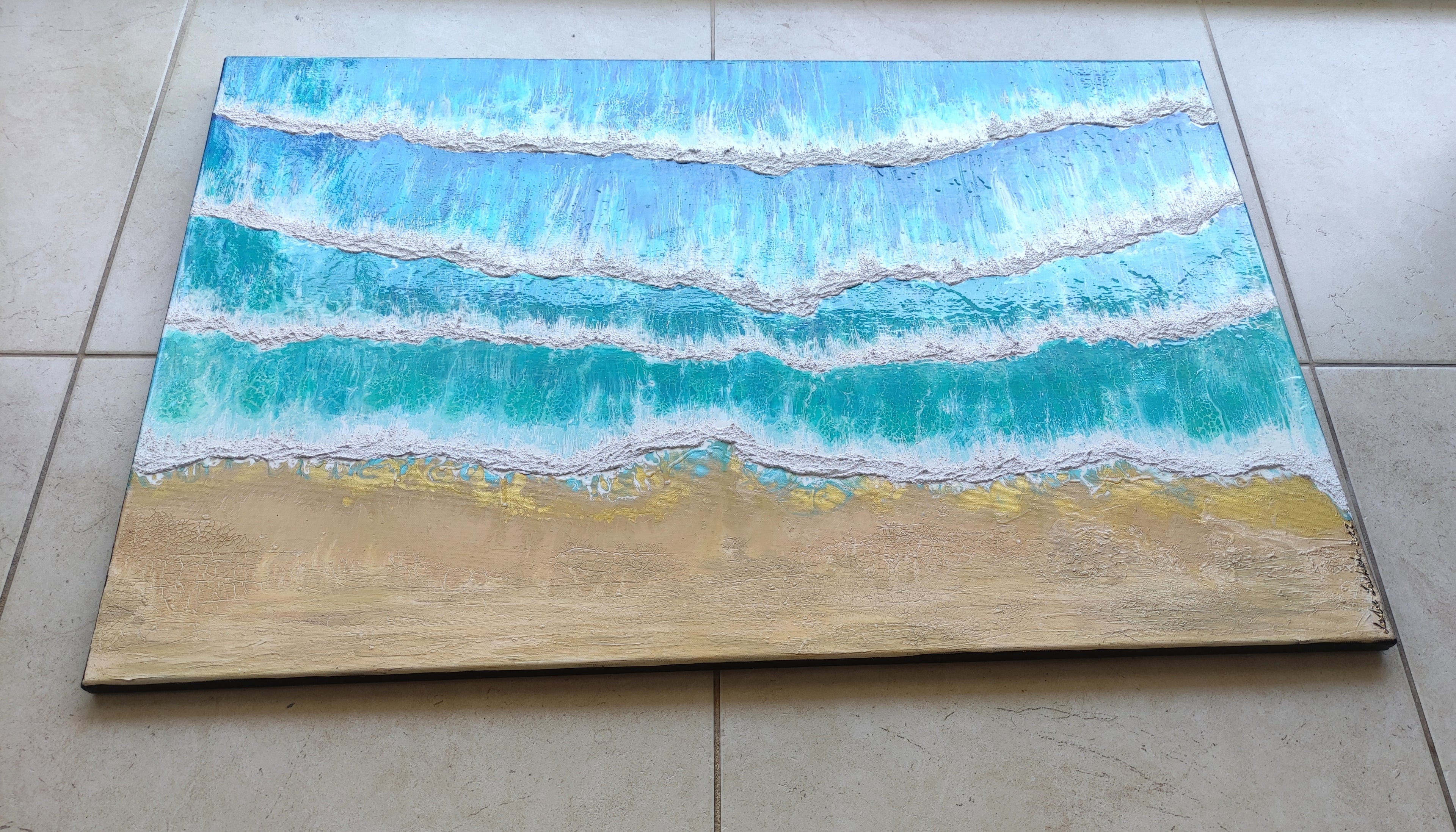 Abstract painting of blue and white waves on a wooden panel