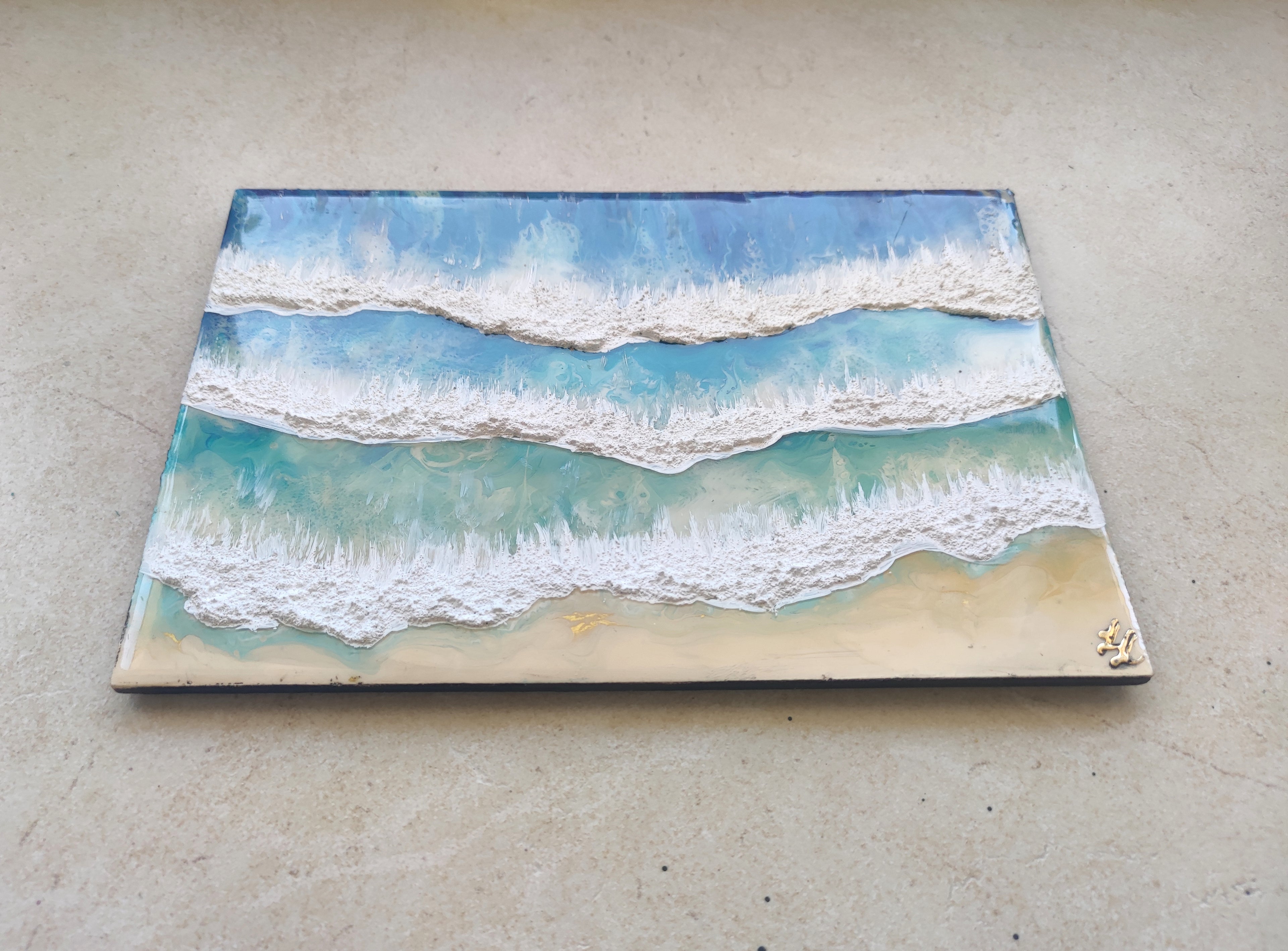 Artistic depiction of ocean waves on a textured surface