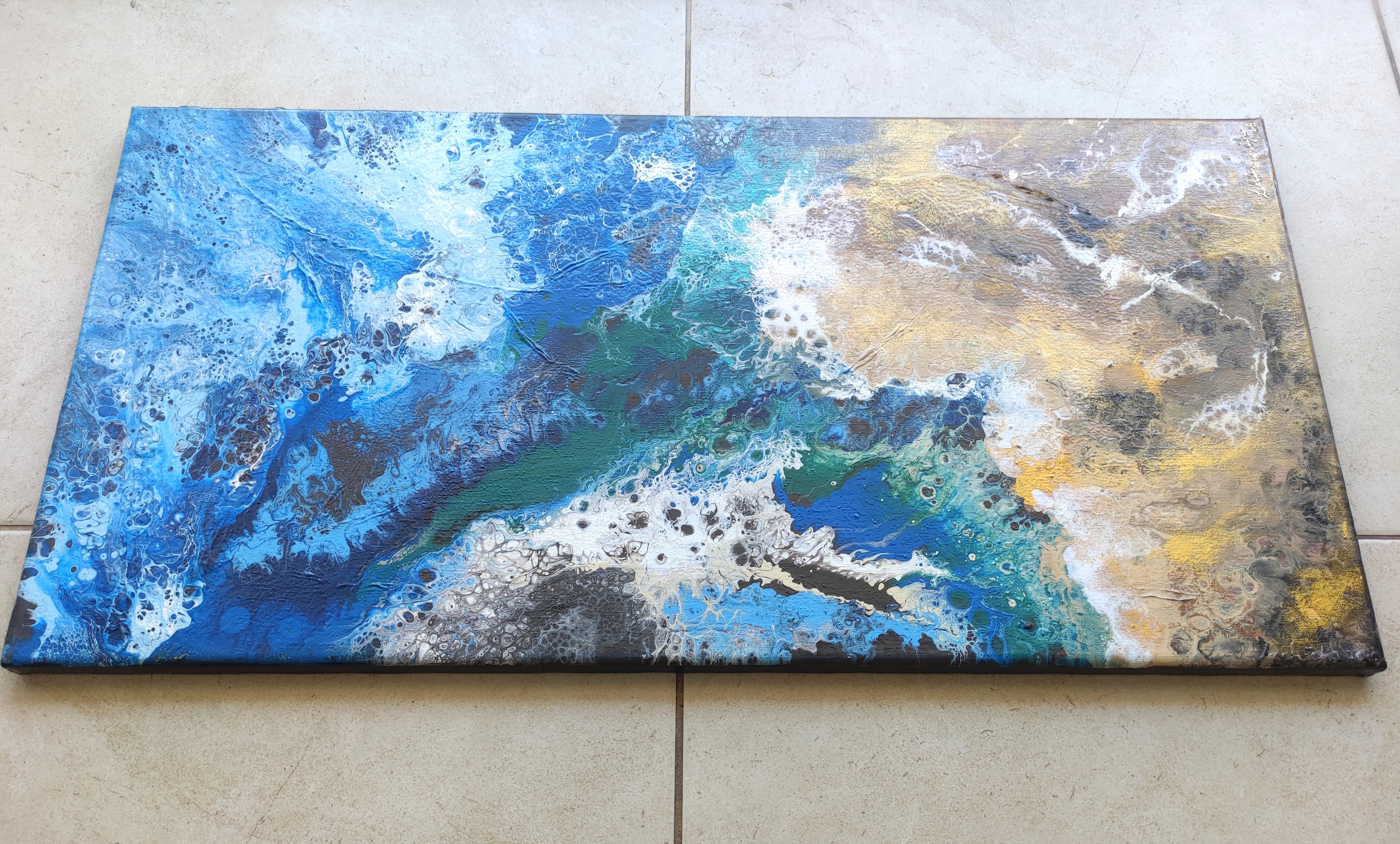 Abstract painting with blue, yellow, and white colors on a textured surface