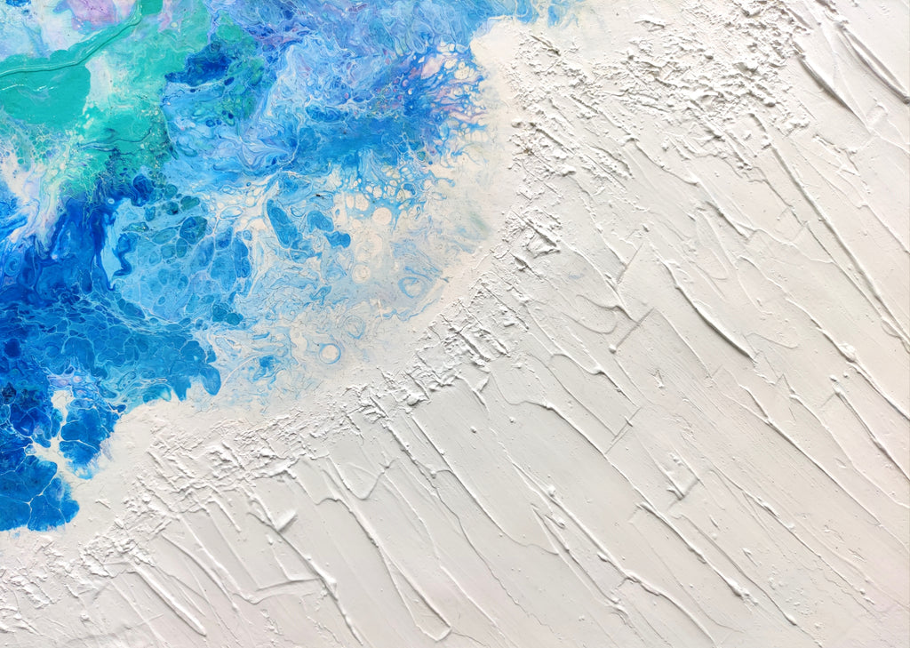 Abstract art with blue and white colors on a textured surface
