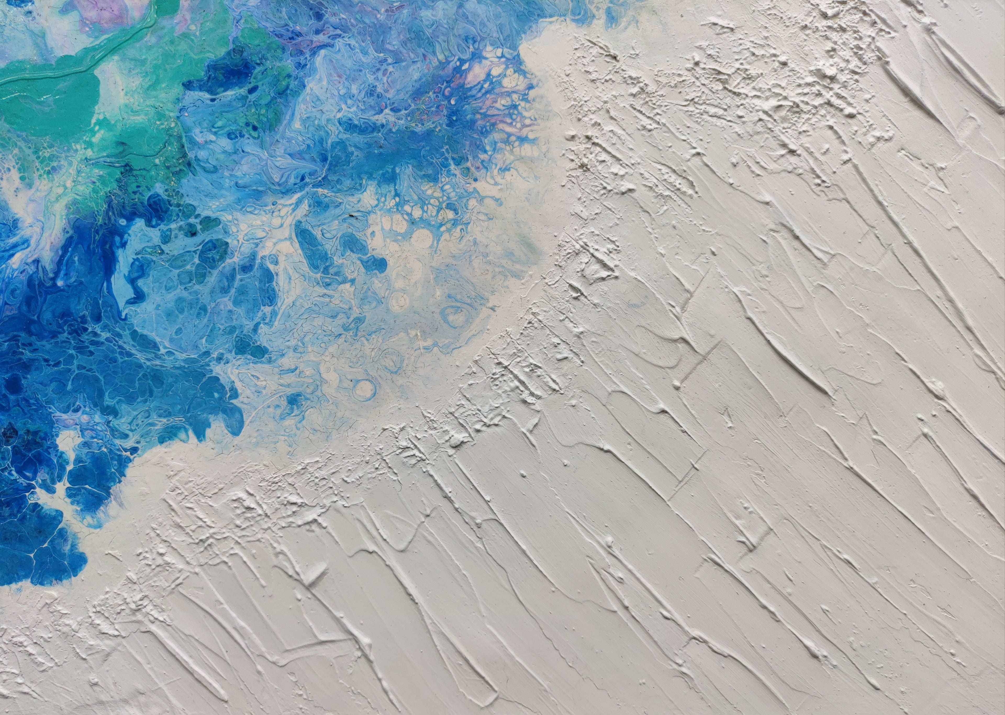 Abstract art with blue and green colors on a textured beige background