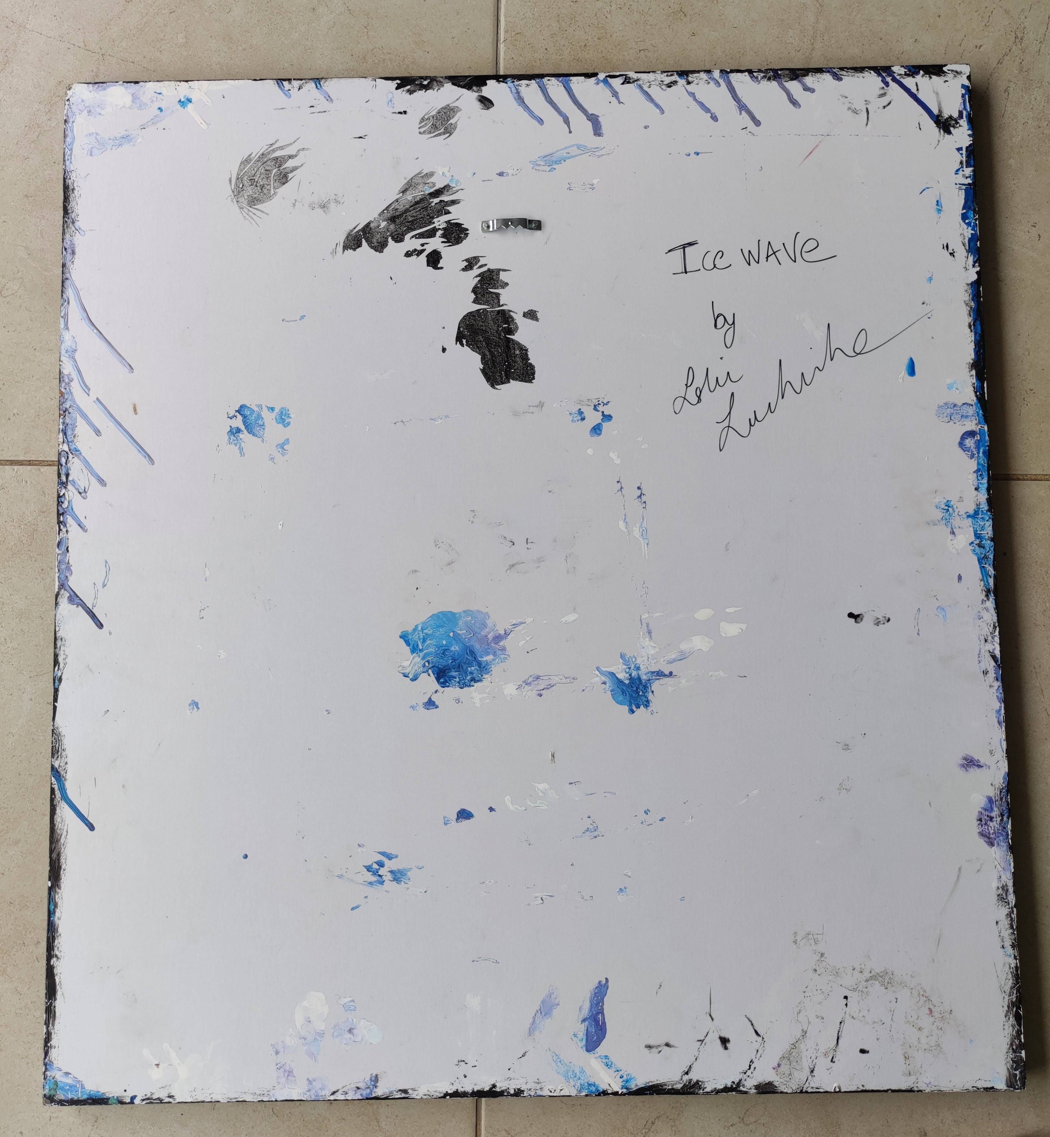 Album cover with artistic design and text on a textured surface