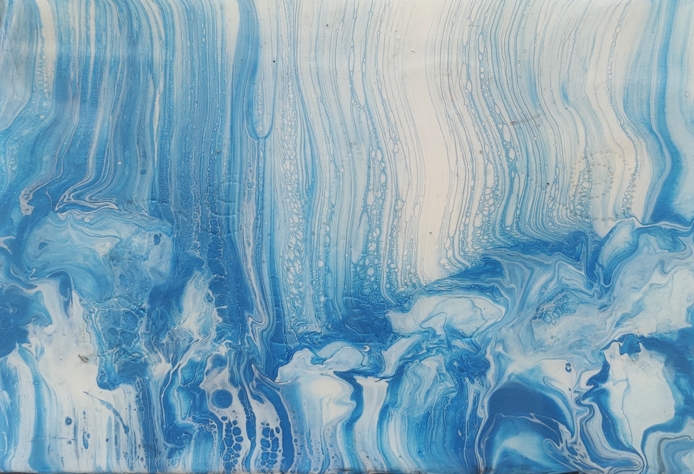Abstract art with wavy blue and white patterns