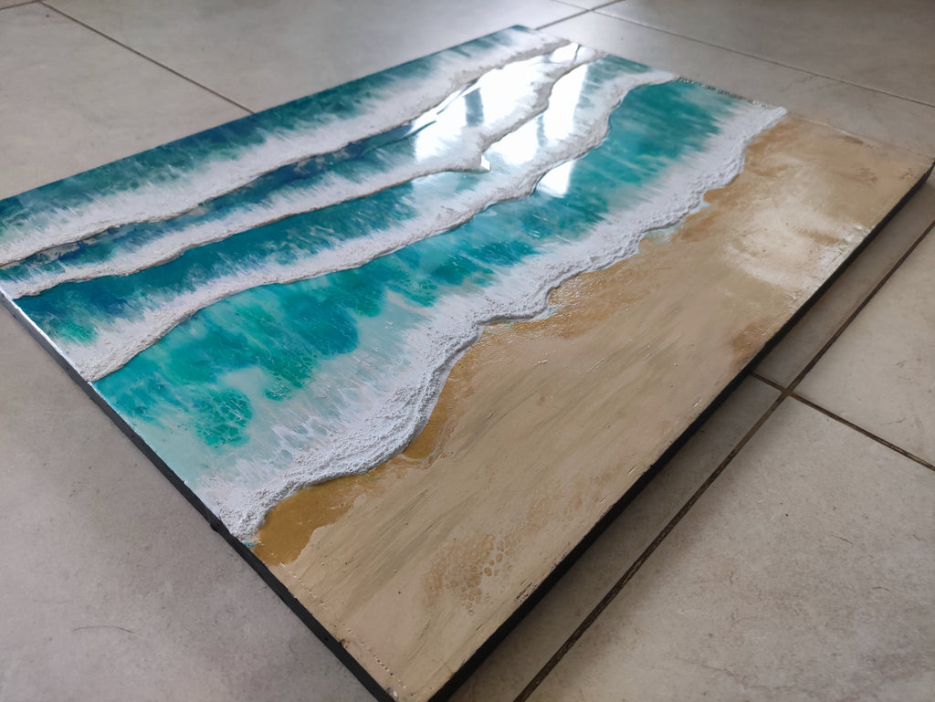 Artistic depiction of ocean waves on a wooden surface