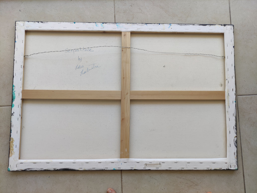 Wooden picture frame with white mat on a tiled floor