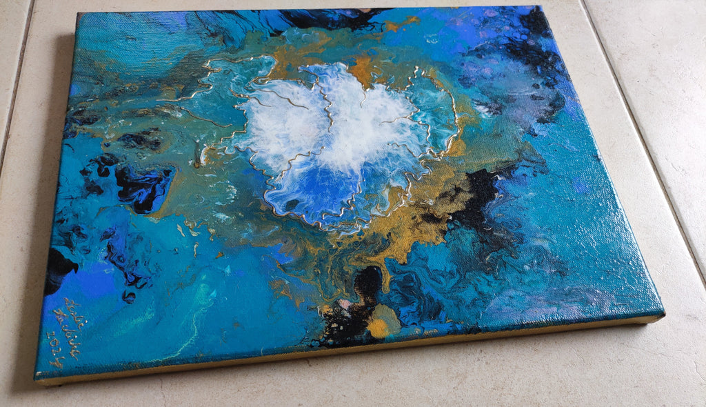 Abstract painting with blue, black, and gold colors on a light background