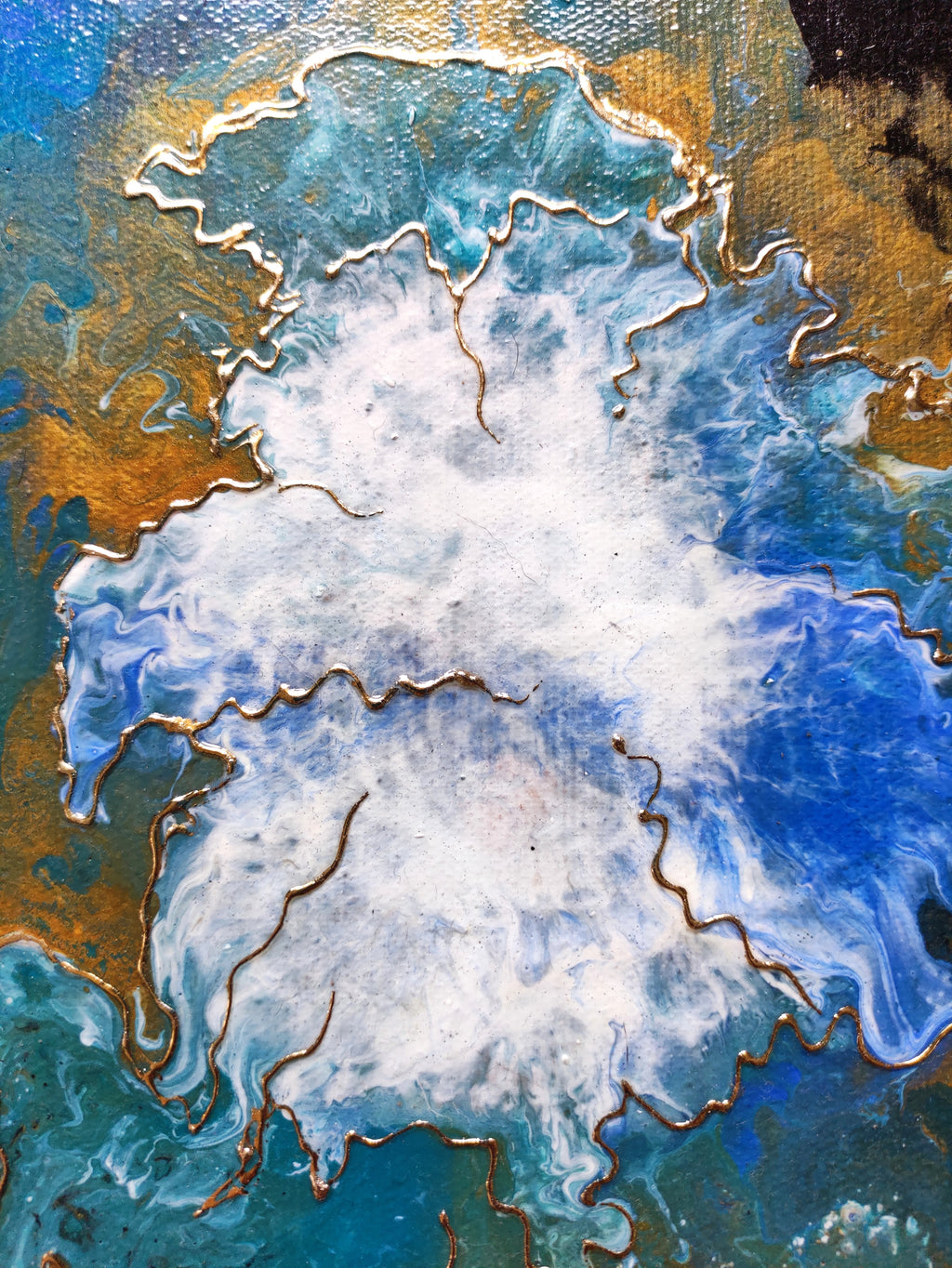 Abstract art with blue, white, and gold colors