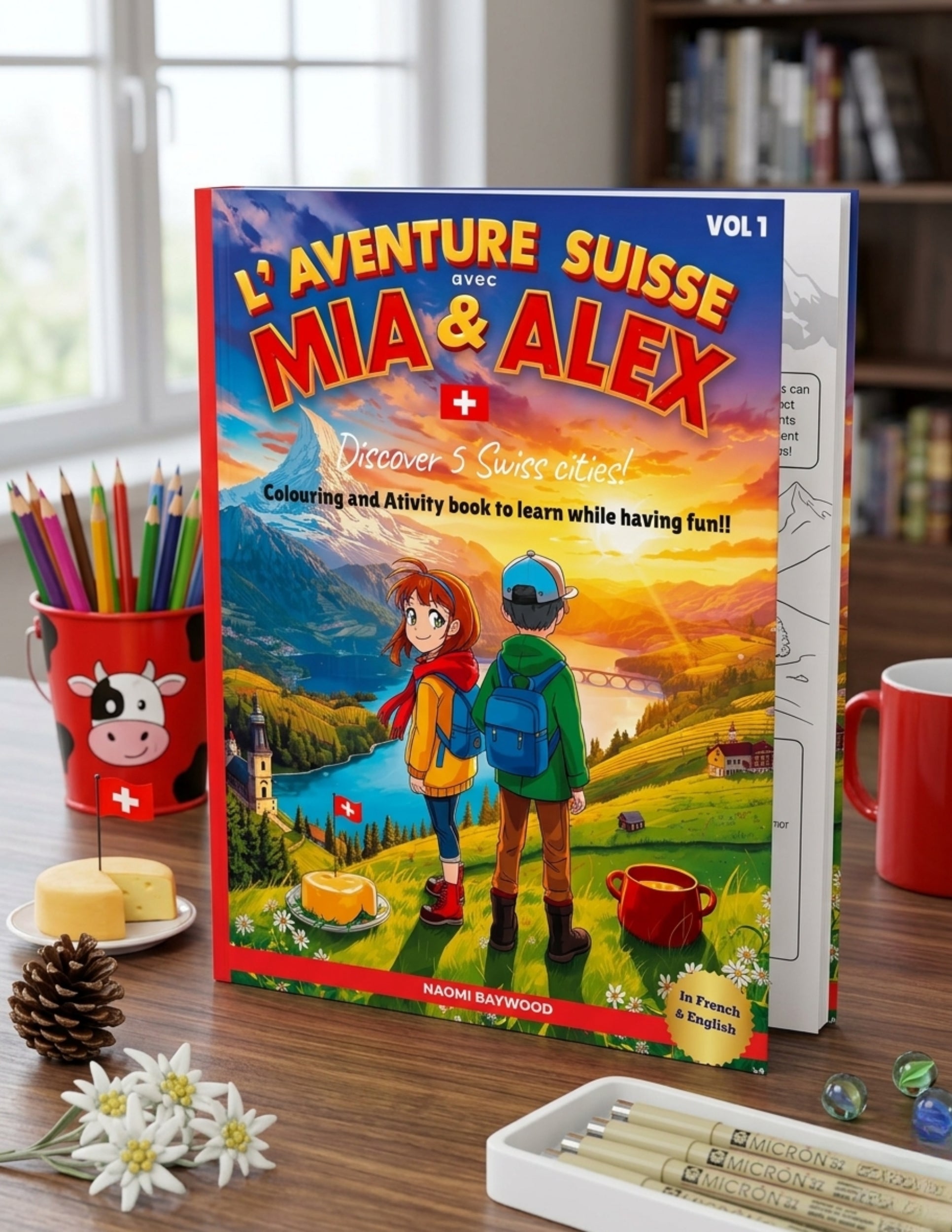 Coloring book titled 'L'Aventure Suisse avec Mia & Alex' on a table with stationery items.