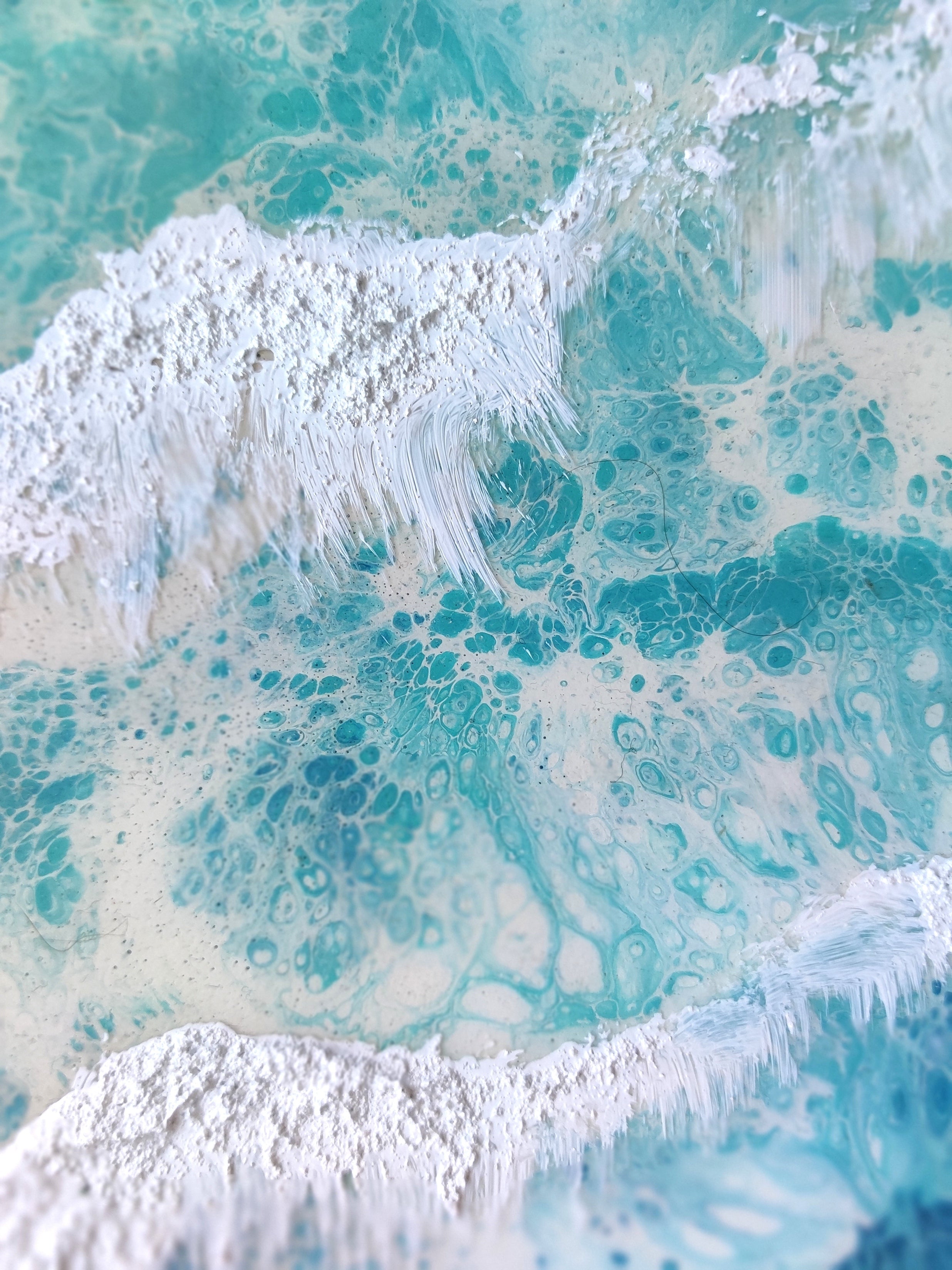 Close-up of frosted glass with blue and white patterns