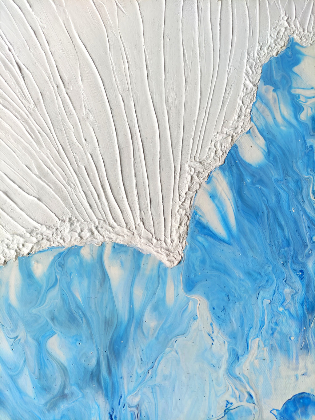 Close-up of a textured surface with white and blue patterns