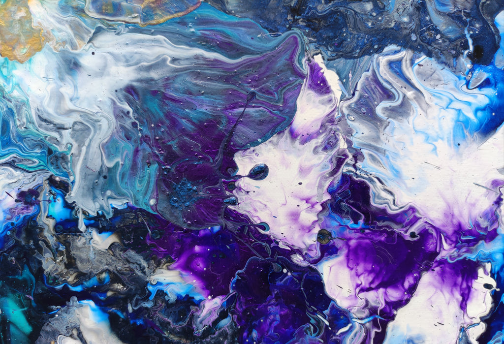 Abstract art with swirling colors of blue, purple, and white.